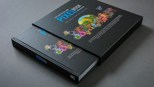 Una foto di The Unofficial GBA Pixel Book, fotografato parzialmente estratto dal suo cofanetto di cartone.